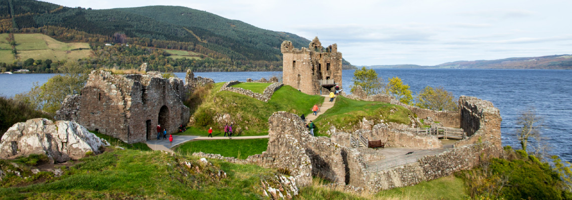 urquhart castle sitting prominently on the shores of loch ness